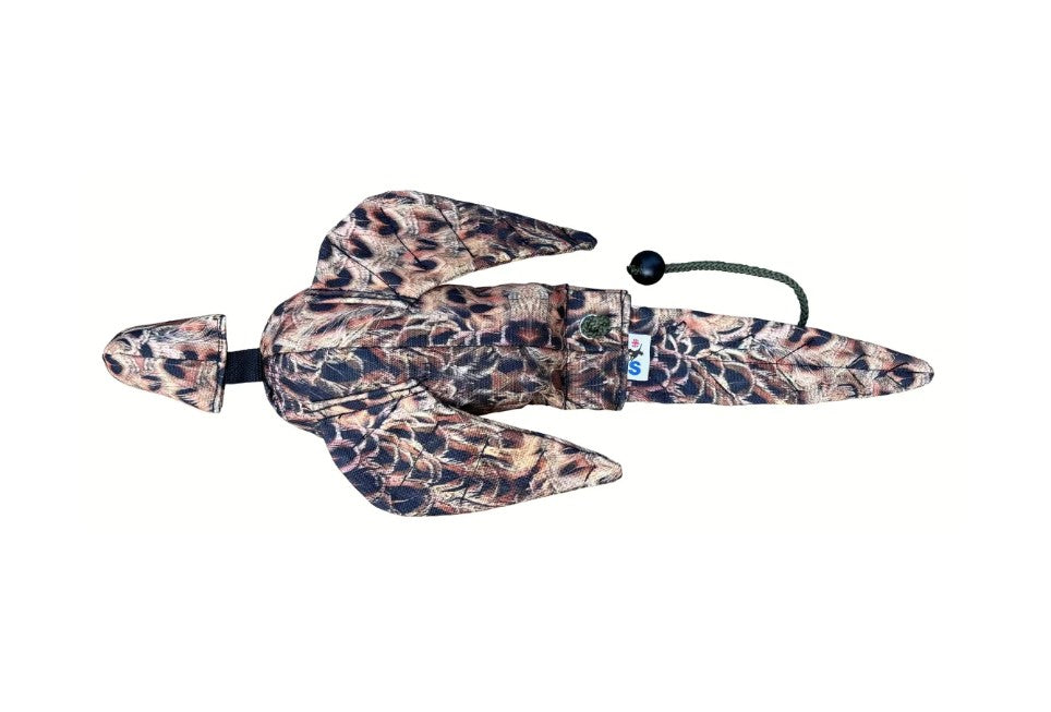 Camouflage-patterned dog toy with a black cord on a white background