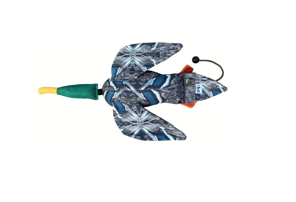 Toy bee with a patterned body on a white background